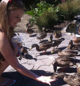 5 me feeding ducks